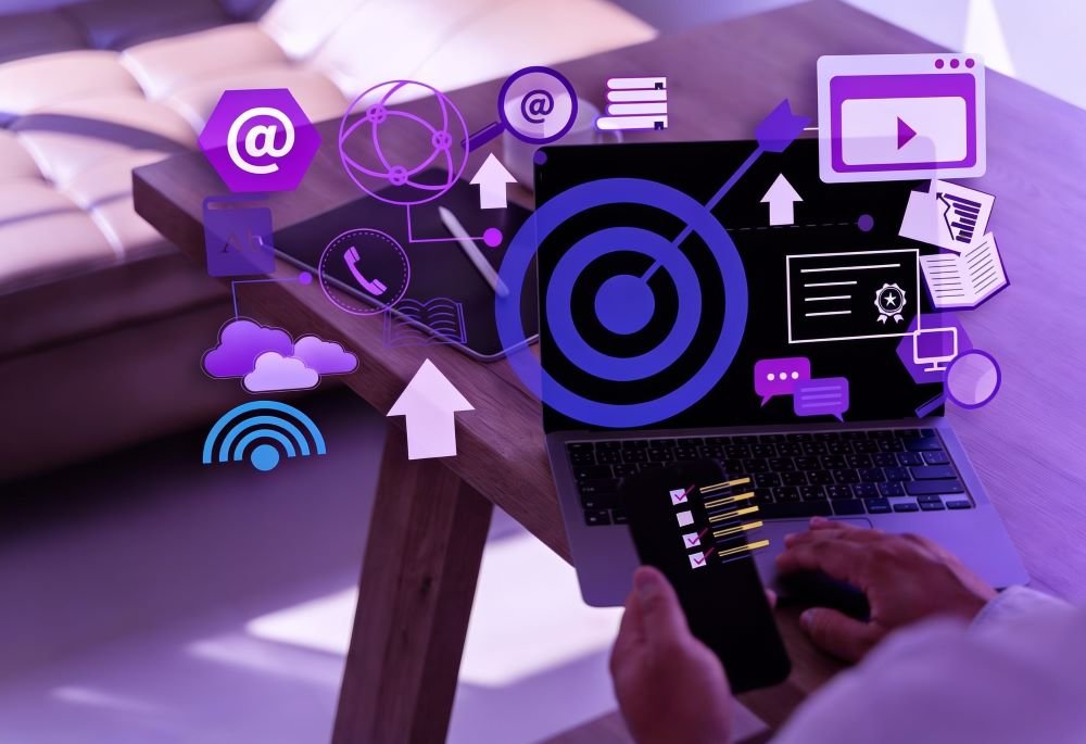 Professional using a laptop and smartphone with digital marketing and business strategy icons representing international expansion and entering the Brazilian market.